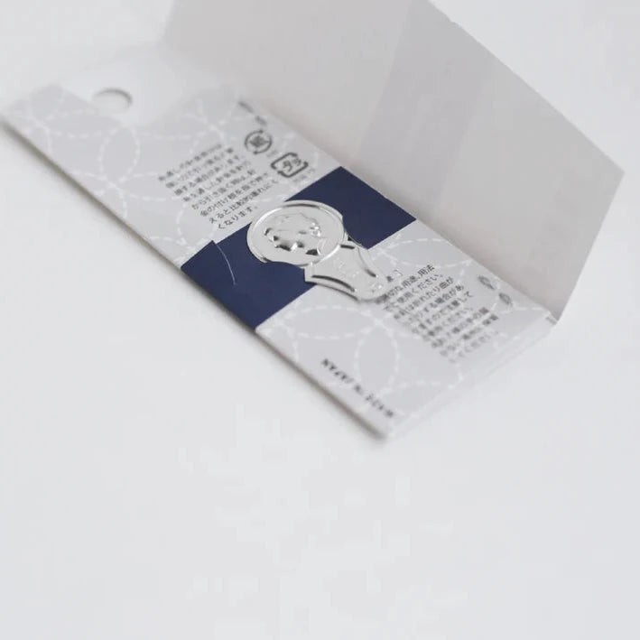 a needle threader in a pack of sashiko needles