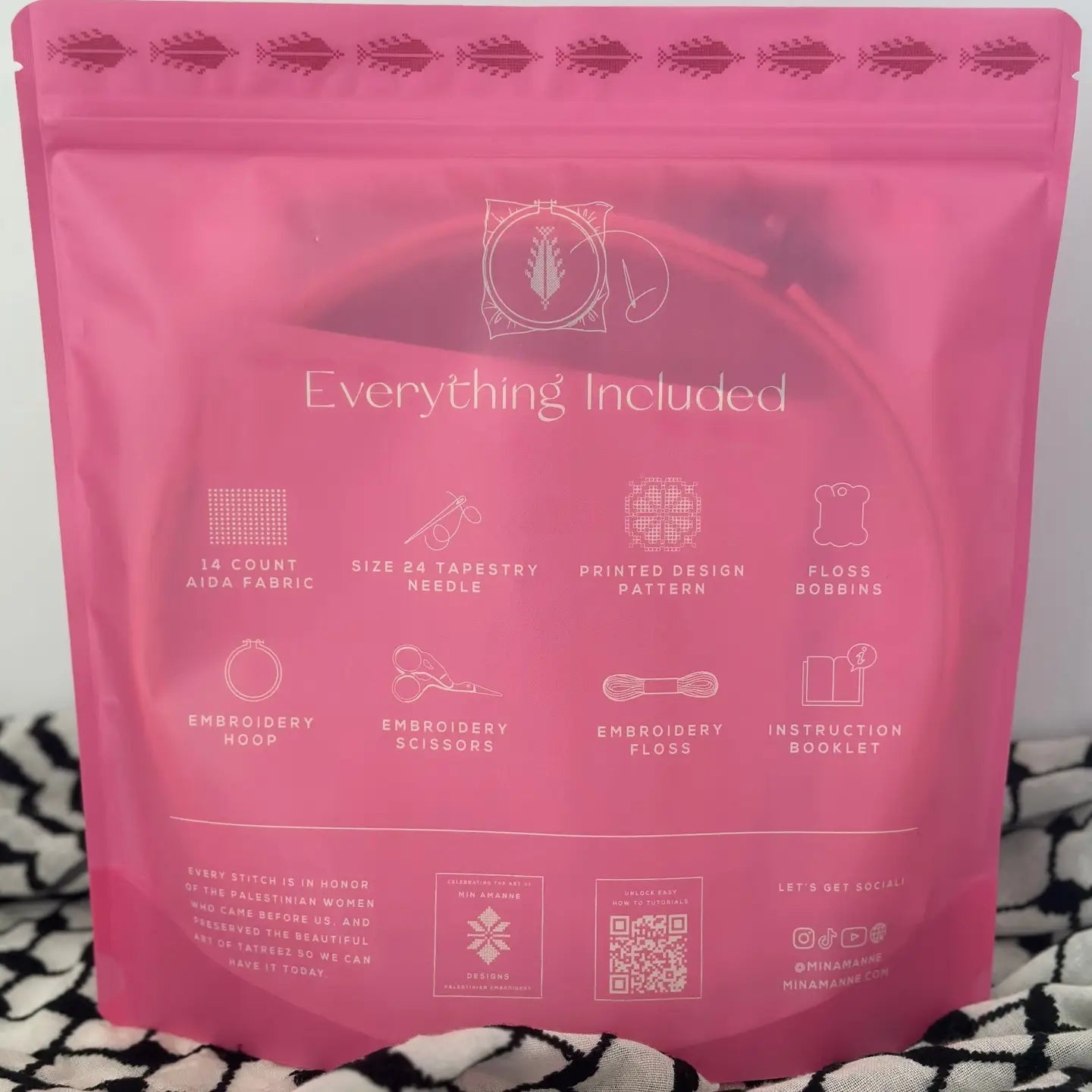 the back of a pink pouch with a list of supplies included