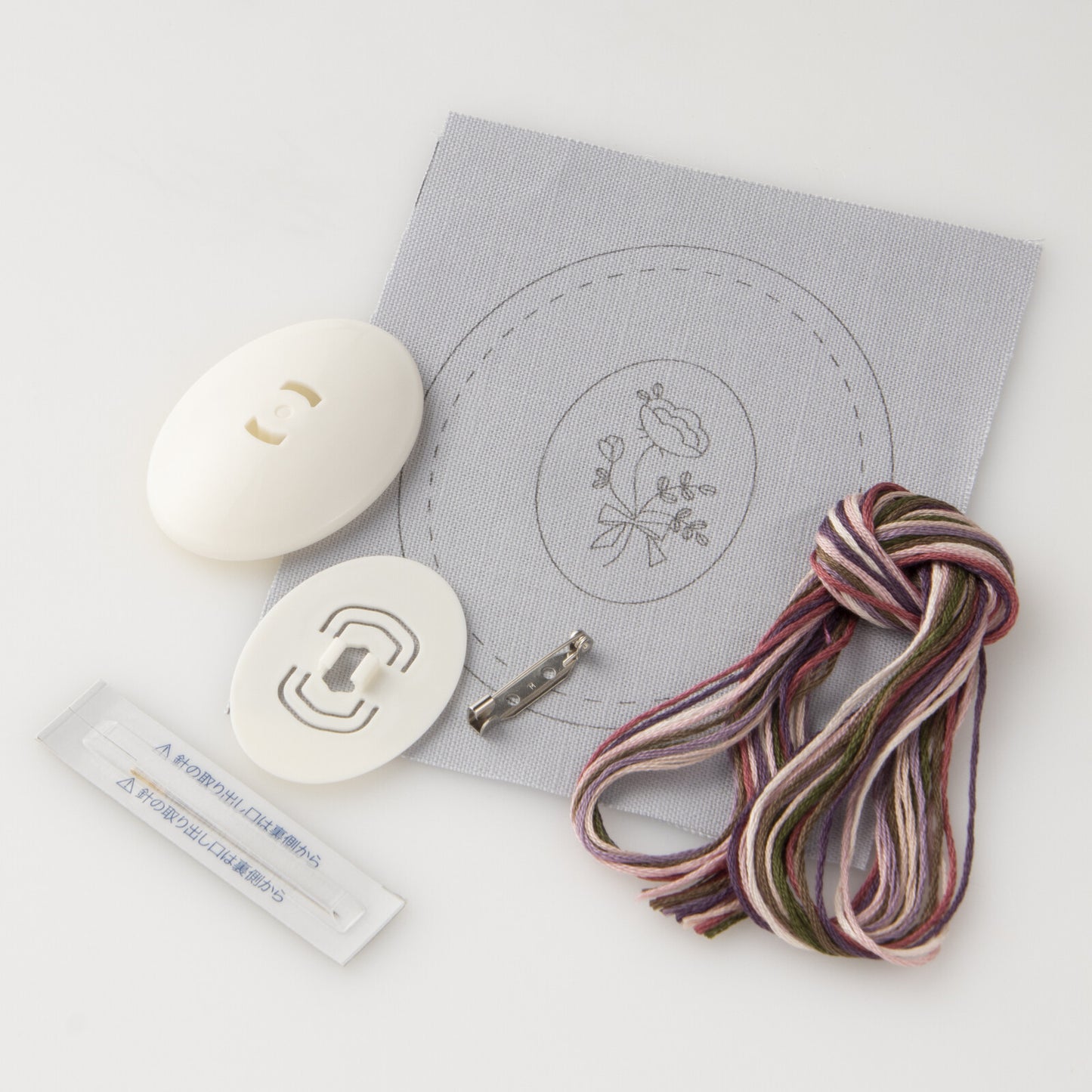 supplies in a kit for an embroidered blue broach