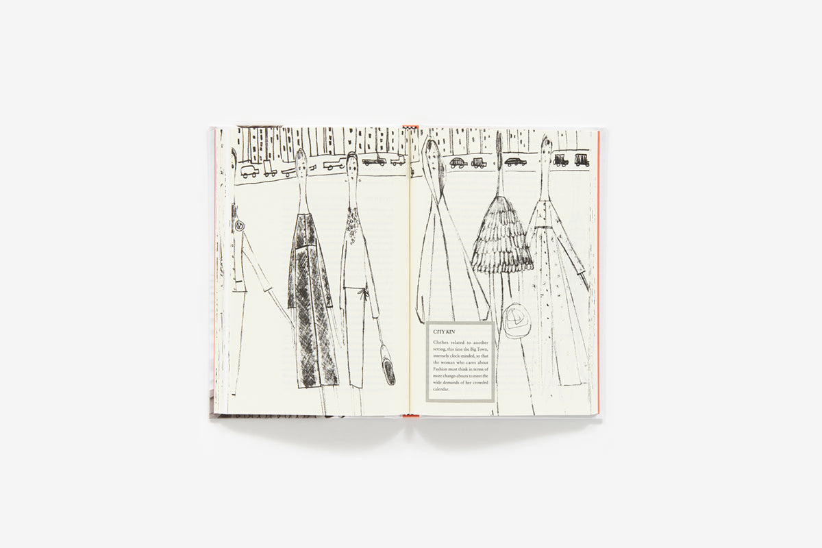 Open book with black and white illustrations of dresses on a white background