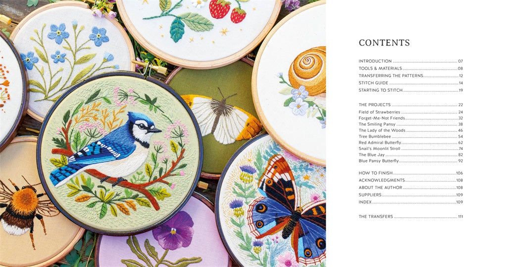 Embroidery hoops with floral and nature-themed designs on a table, with a table of contents on the right.