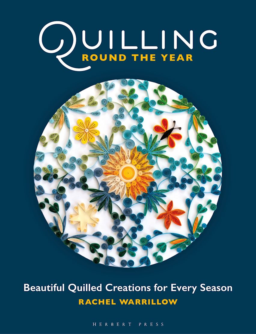 Book cover of 'Quilling Round the Year' with a floral design on a blue background