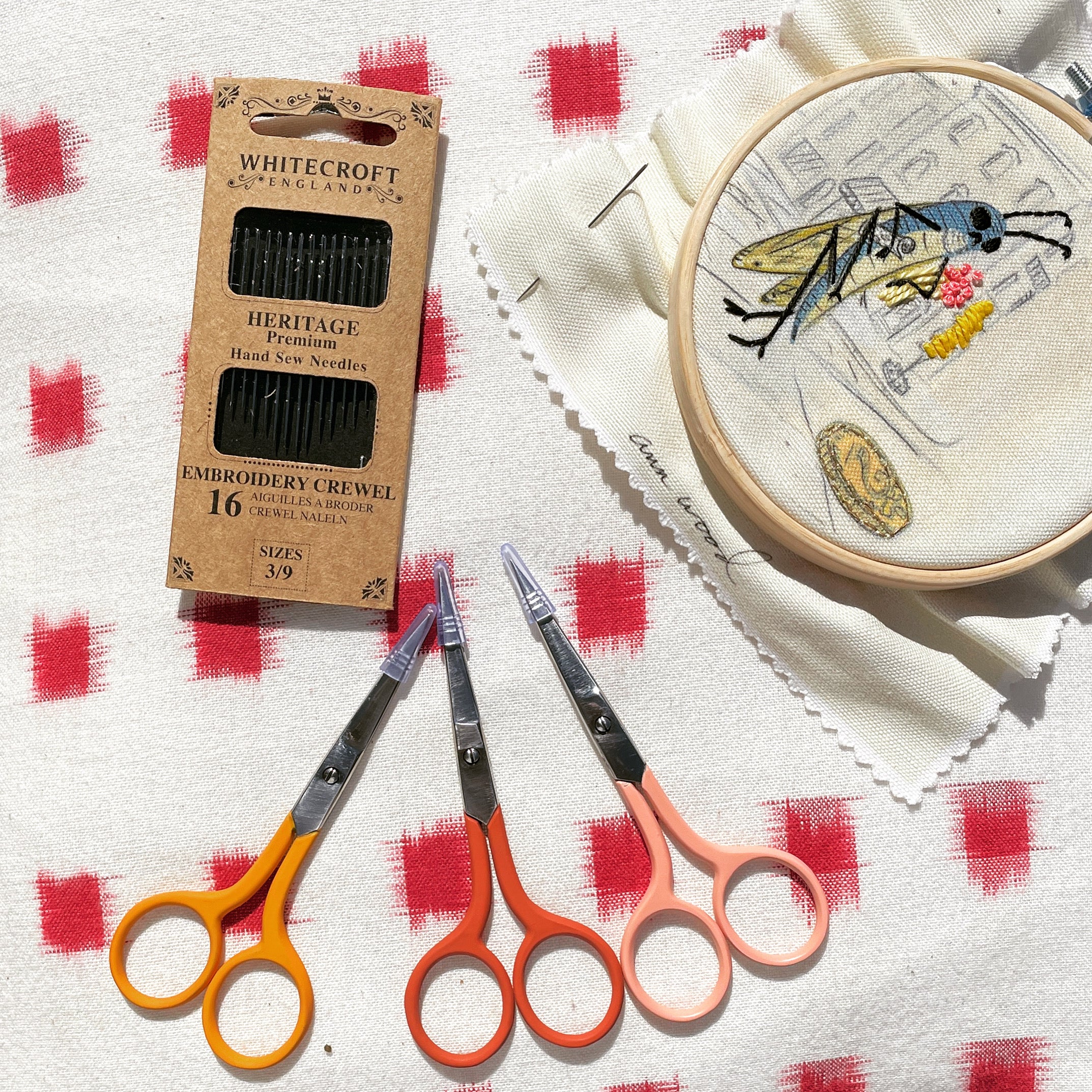 Embroidery scissors and needles