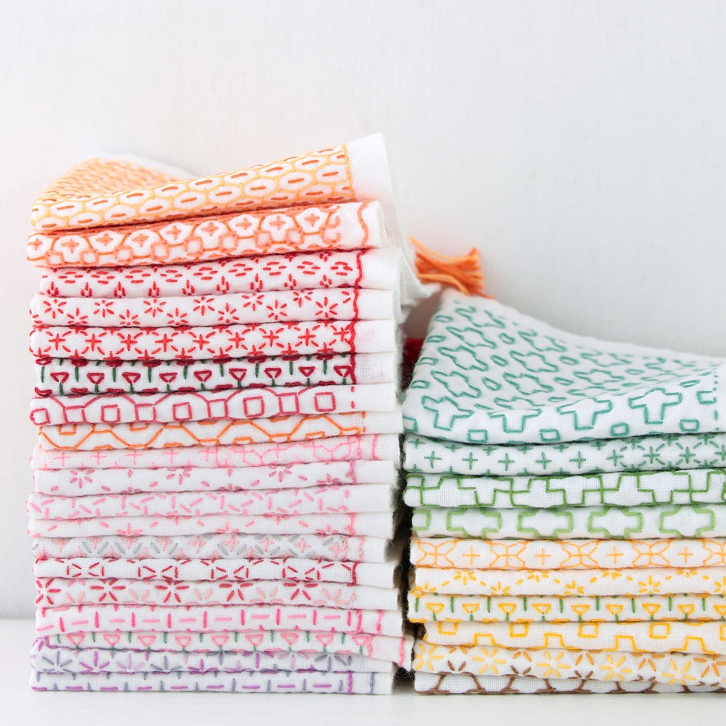 stack of colorful sashiko cloth