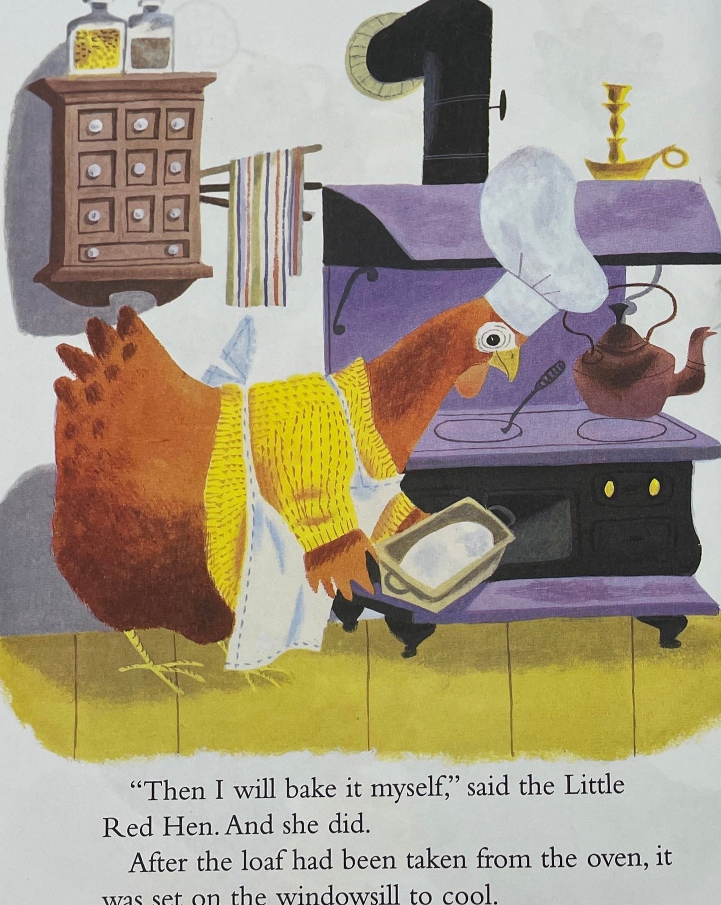 a red hen baking a loaf of bread