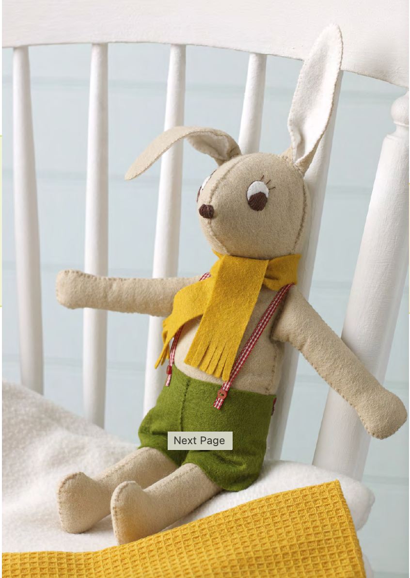 Felt bunny with green shorts and a yellow scarf