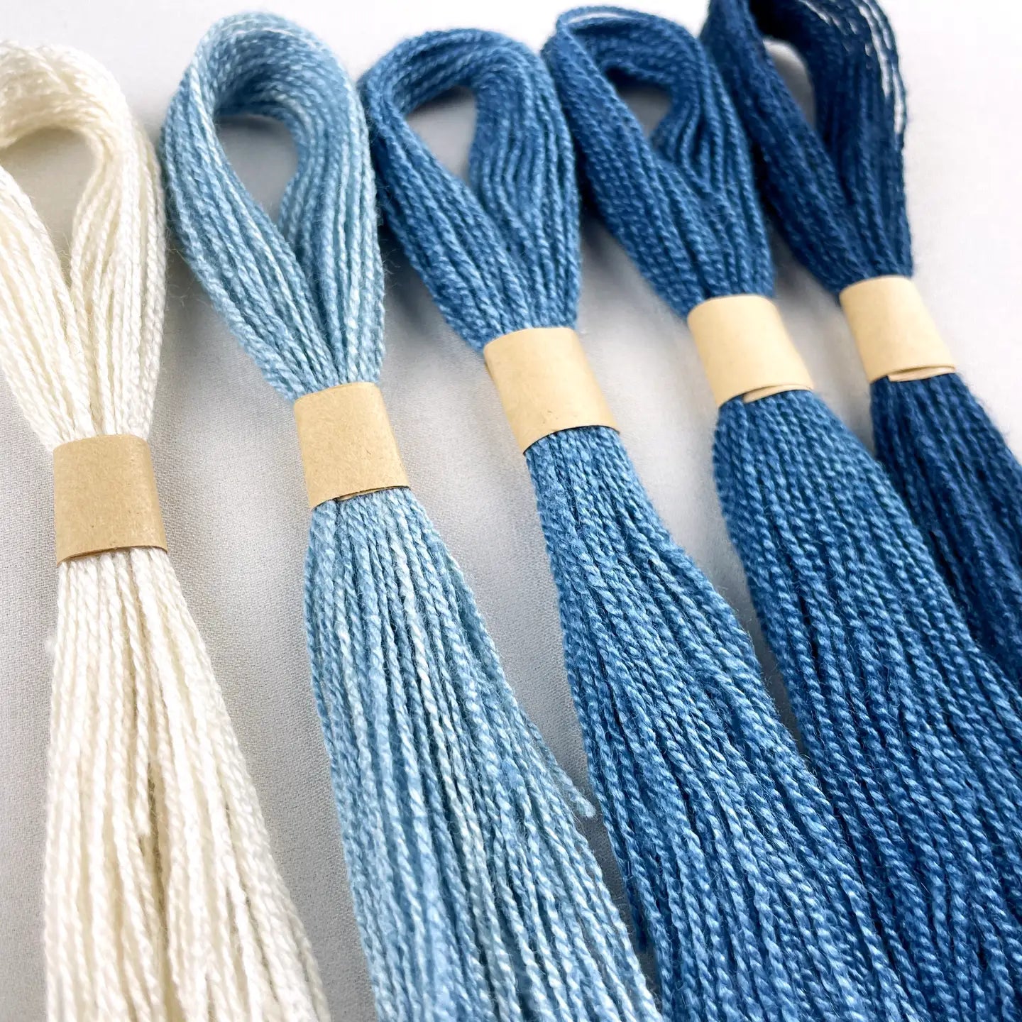 a close up of blue silk thread