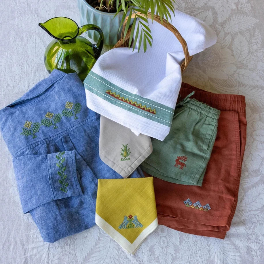 embroidered clothing on a white textured background