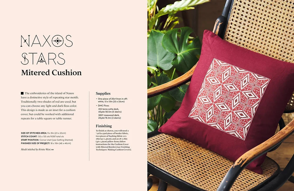 red pillow with cross stitch embroidery