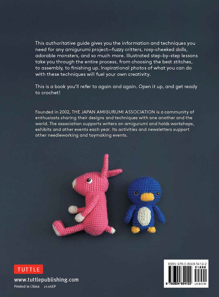 a crocheted pink rabbit and blue penguin