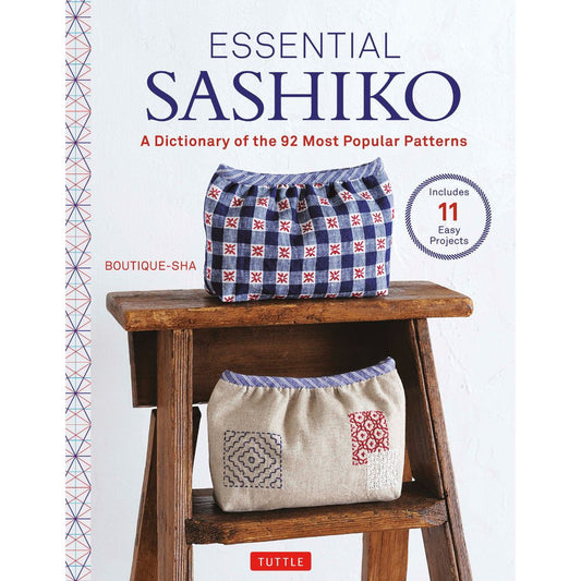 sashiko embroidered bags on a stool