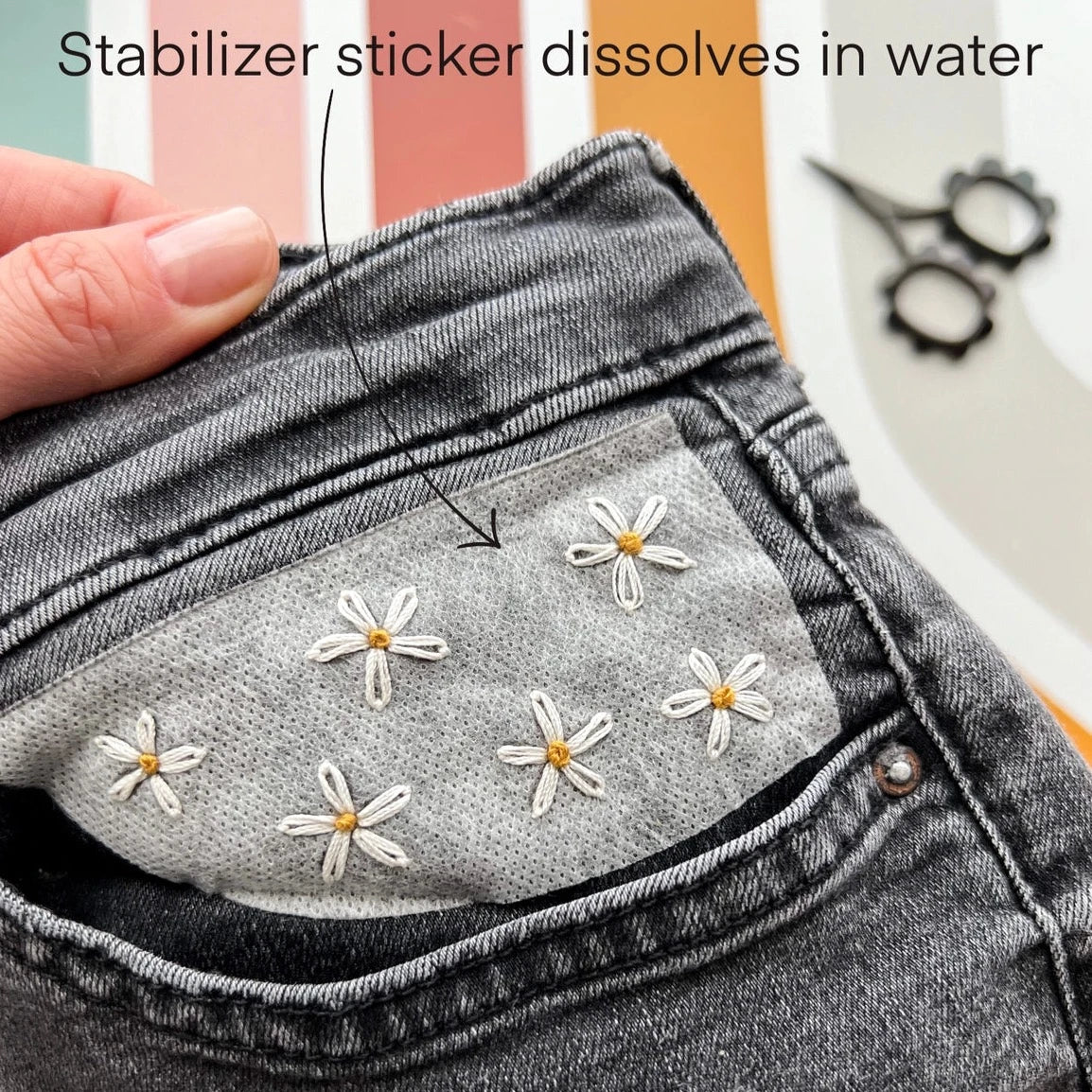 daisies embroidered on jeans pocket