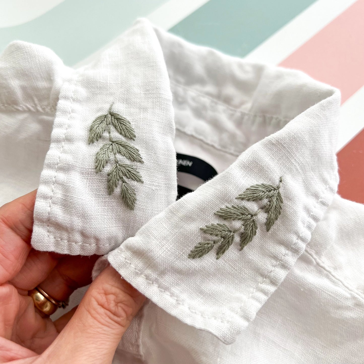 green leaves on white shirt collar