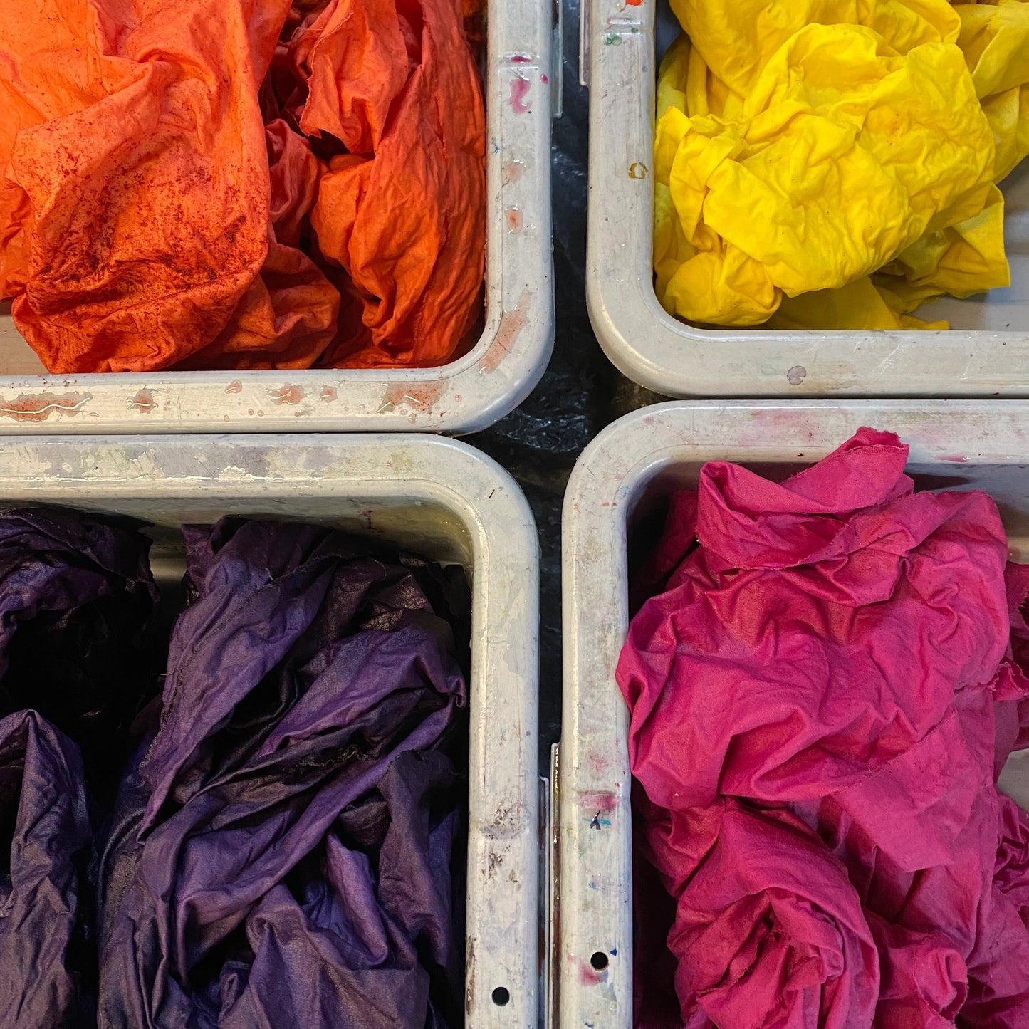 Orange, yellow, purple and fuchsia dyed fabric