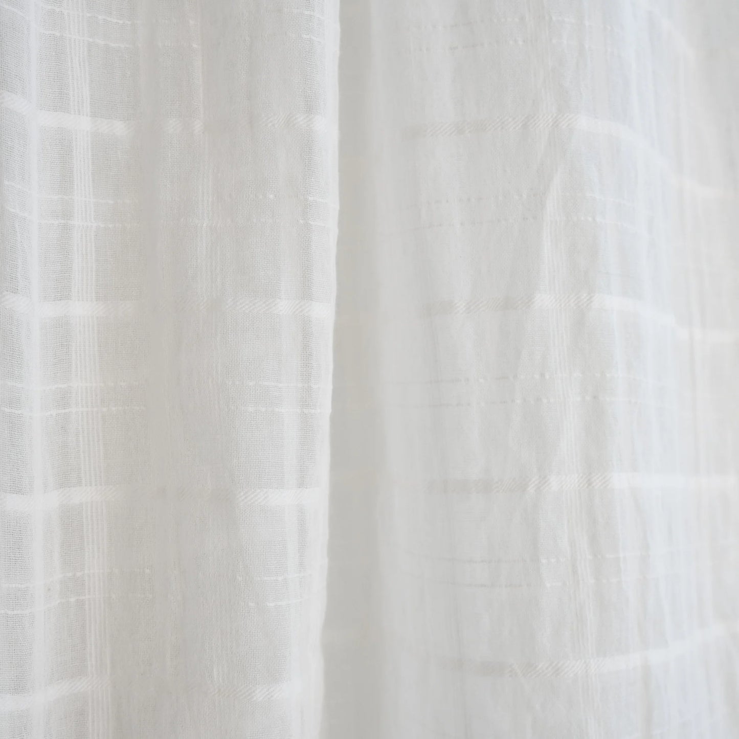 a white lightweight organic cotton scarf