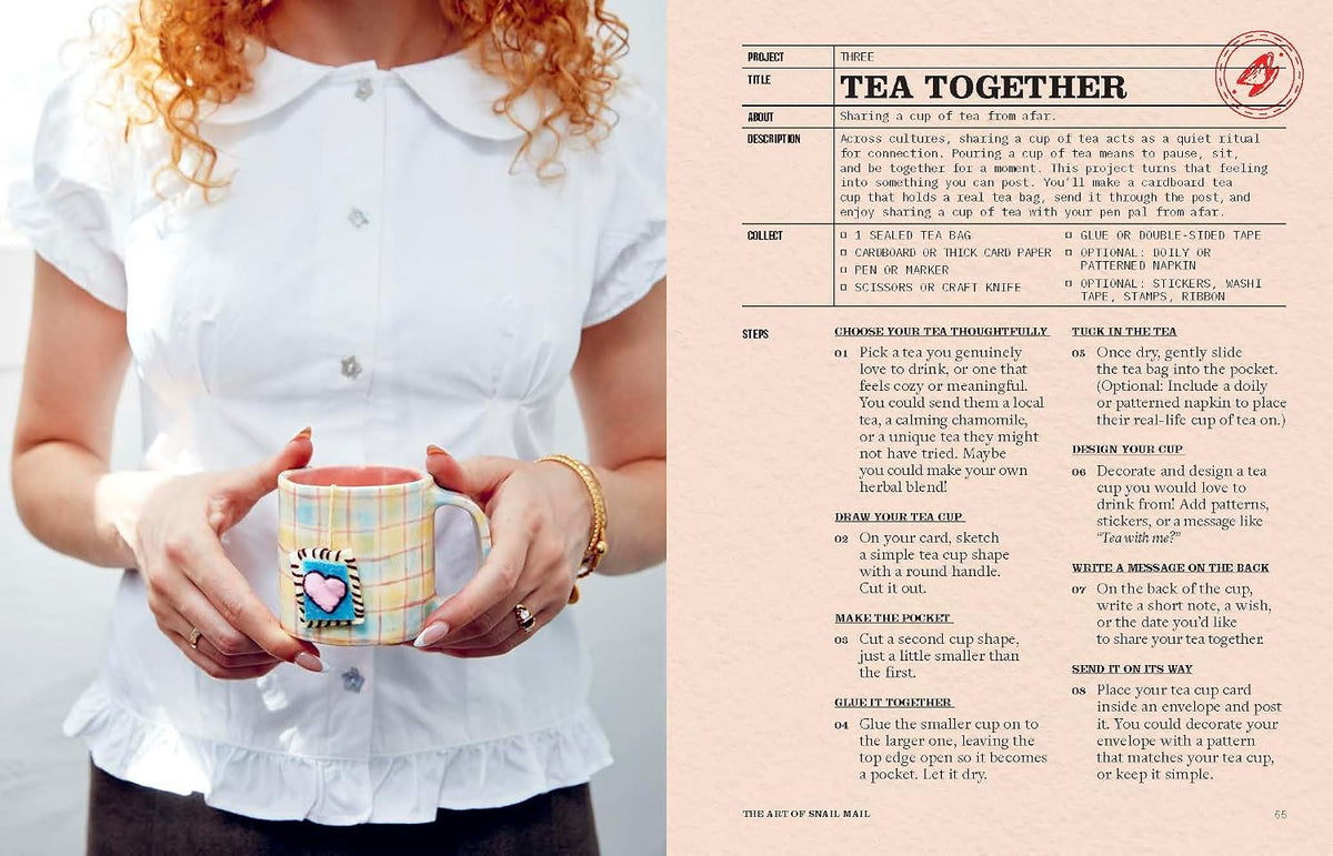 a woman in a white blouse holding a mug of tea