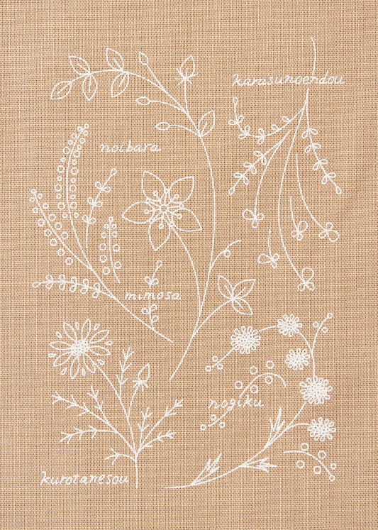 A tan pre printed cloth for embroidery