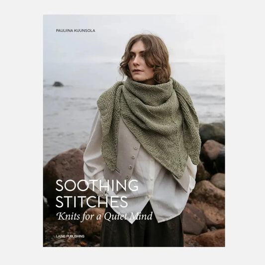a woman wearing a light green shawl
