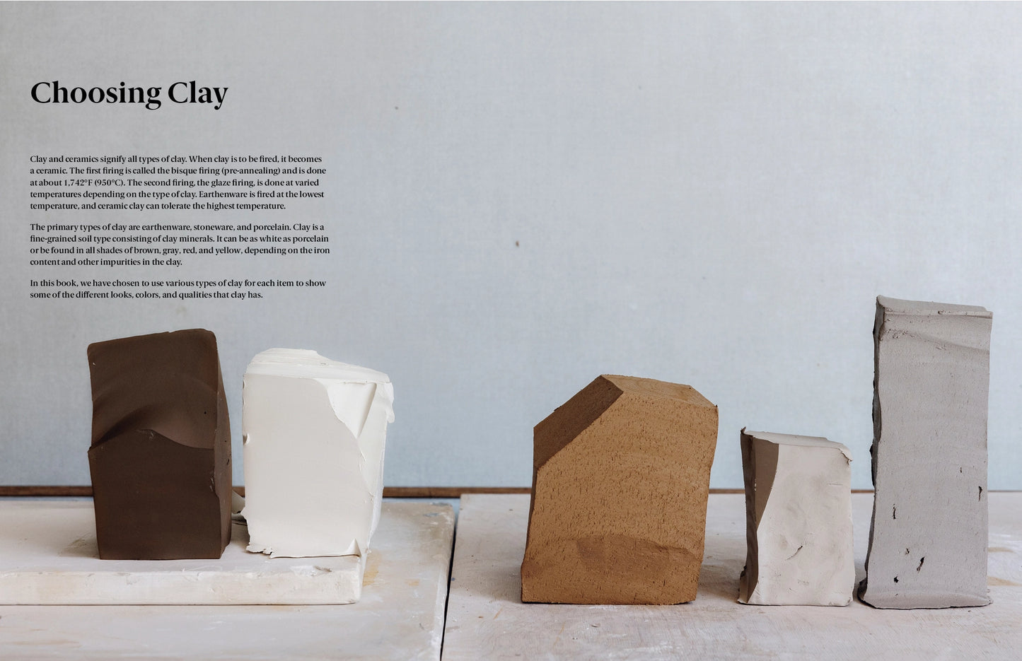 Five different clay blocks on a white surface with a gray background