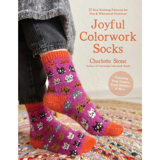 Book cover of 'Joyful Colorwork Socks' by Charlotte Stone with a person wearing patterned socks.