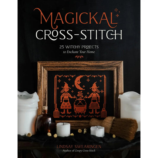 Book cover of 'Magickal Cross-Stitch' with cross-stitched design and witch-themed decor.