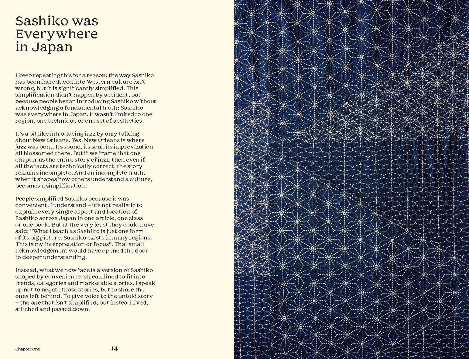 a book page with elaborate white sashiko stitching on blue cloth