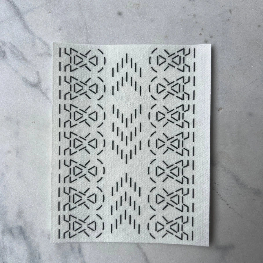 Patterned paper on a marble surface