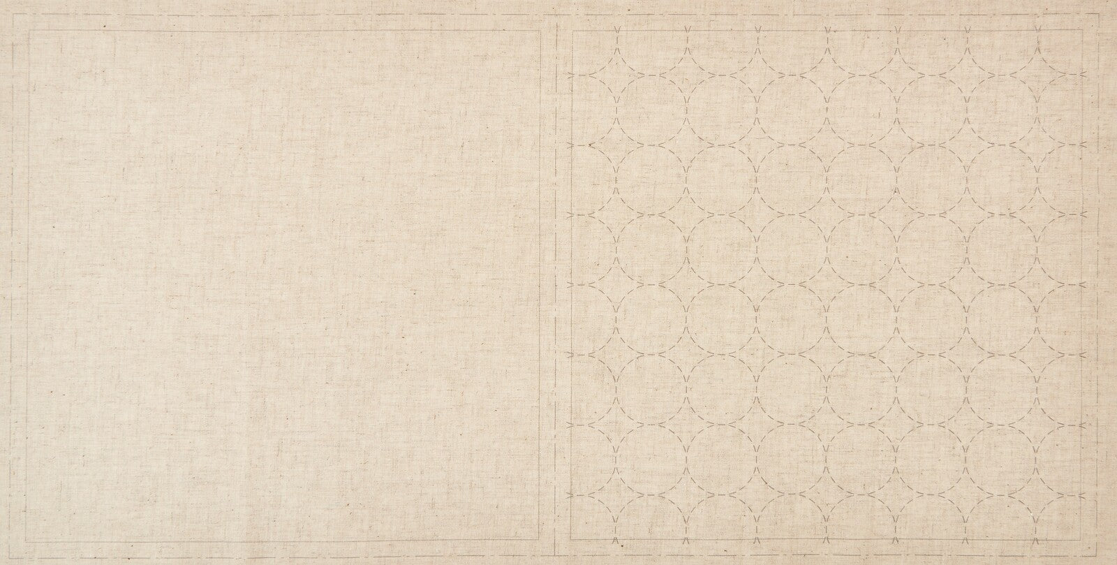 a natural cotton linen cloth printed with circles in a sashiko design