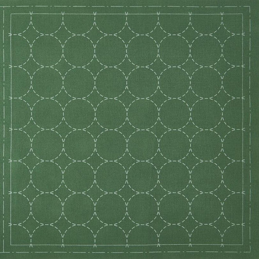 cotton linen sashiko cloth printed with circles on a green background