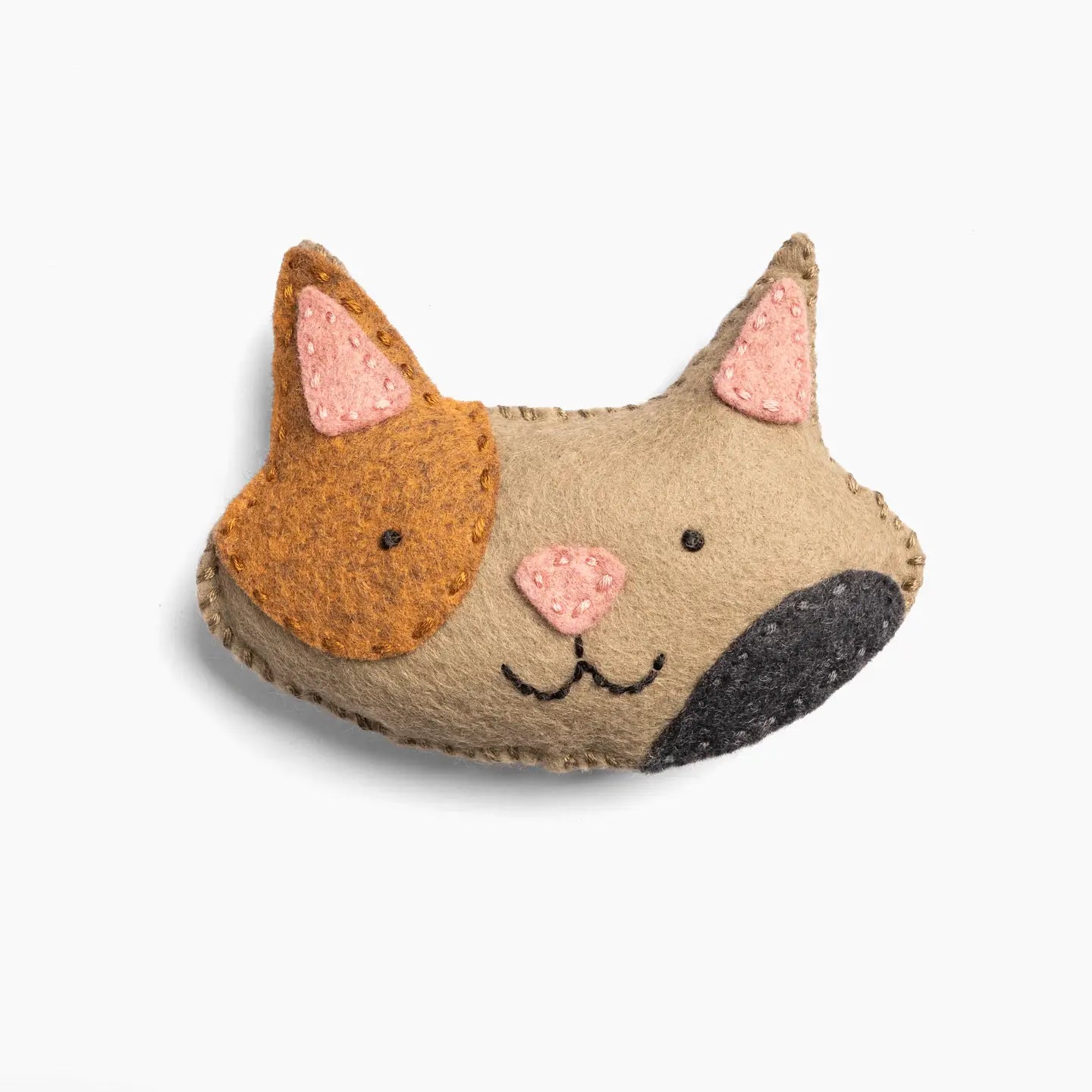 A brown felt cat with spots