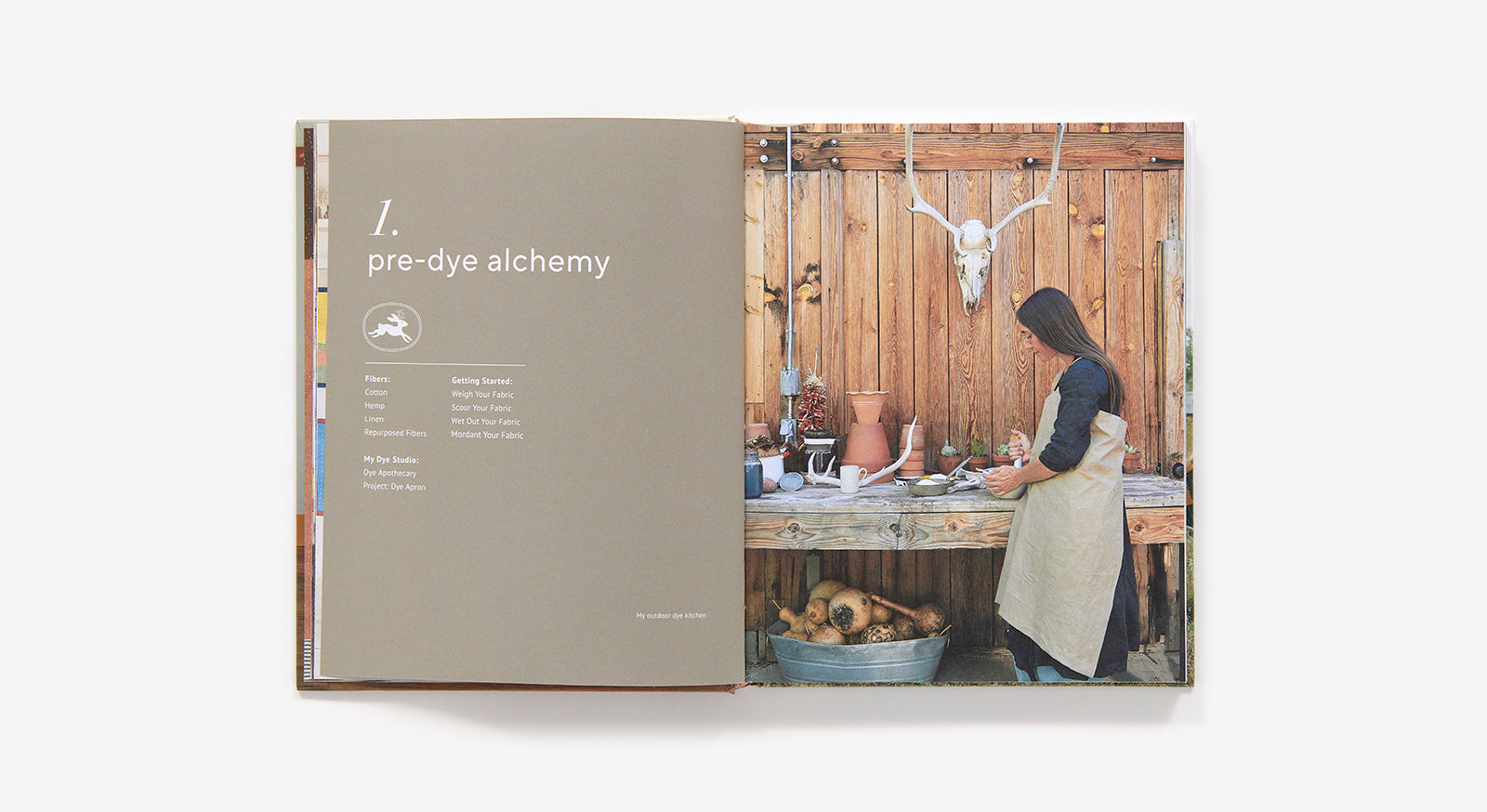 Open book showing a page with text and an image of a person in a workshop.