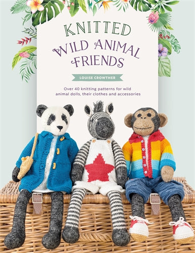 a knitted panda, zebra and monkey sitting on a basket