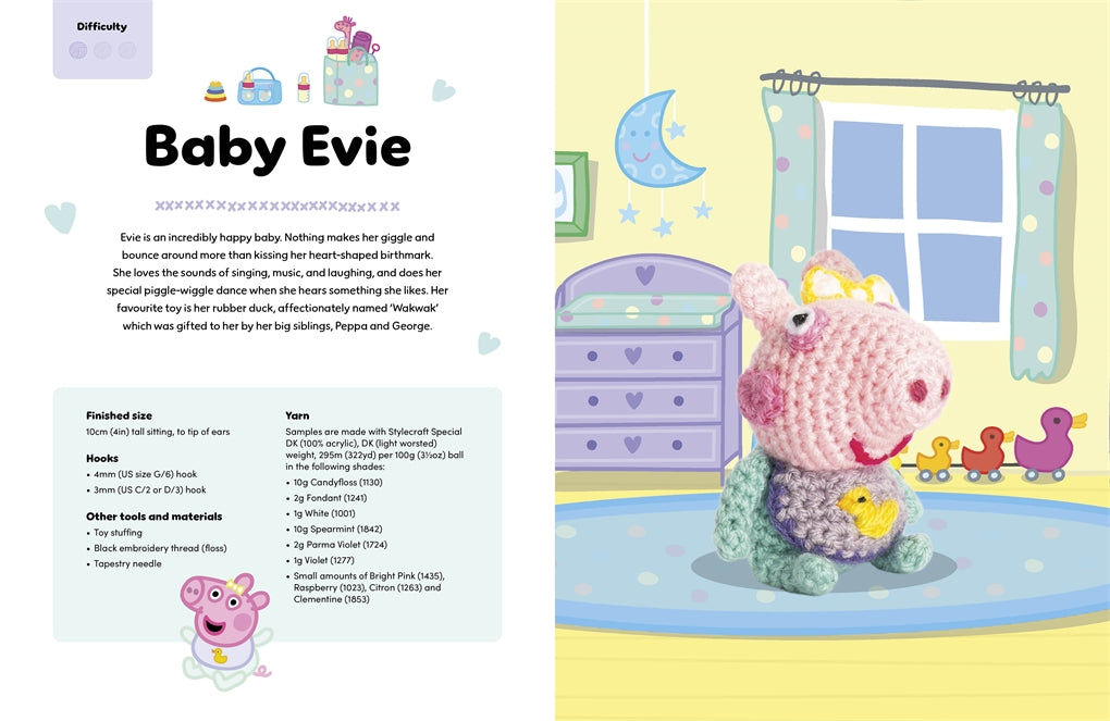 Crocheted baby toy with a purple duck bib in a nursery setting.