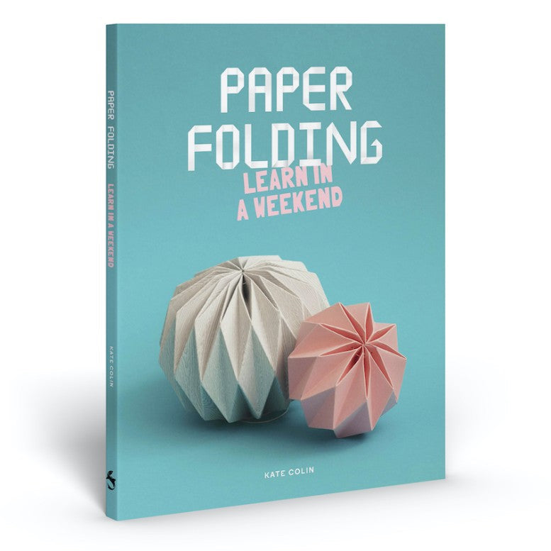 Book cover with 'Paper Folding Learn in a Weekend' text and origami models on a teal background