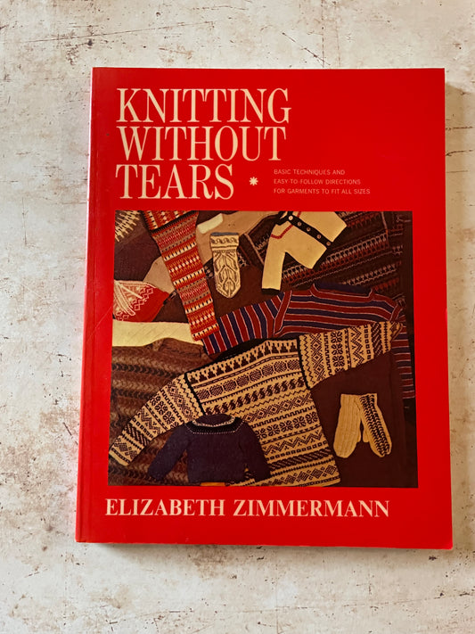 Book titled 'Knitting Without Tears' by Elizabeth Zimmermann on a textured surface
