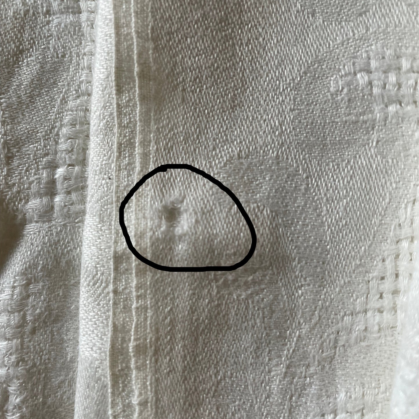 Close-up of textured fabric napkin with a focus on pattern and texture.