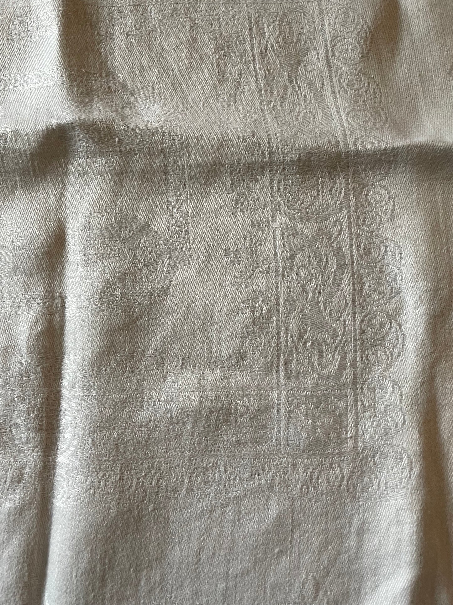 Textured fabric with subtle patterns and folds