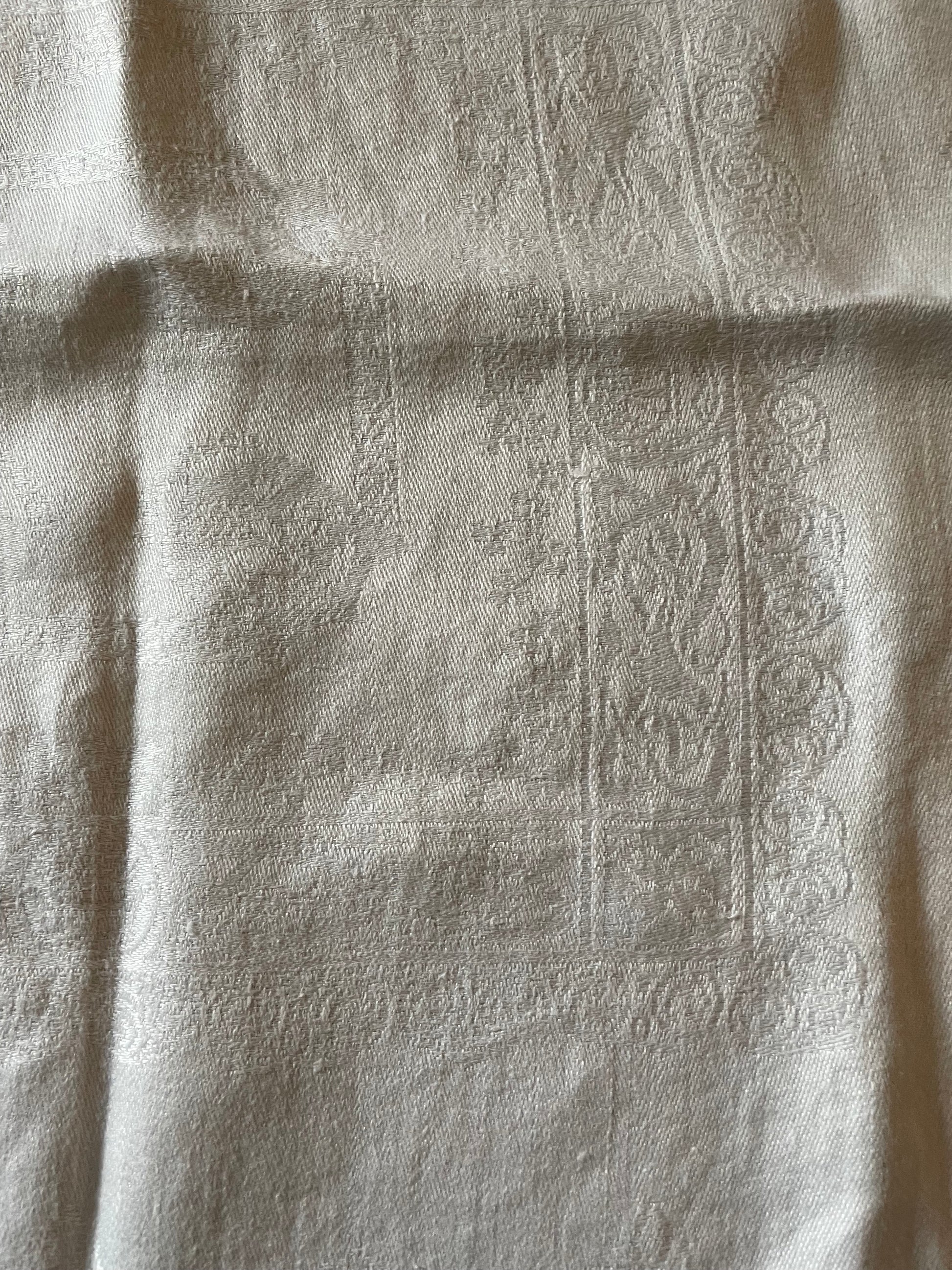 Textured fabric with subtle patterns and folds