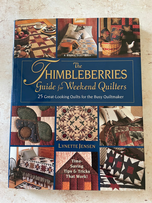A quilting book cover with a grid of muted earth tone quilts