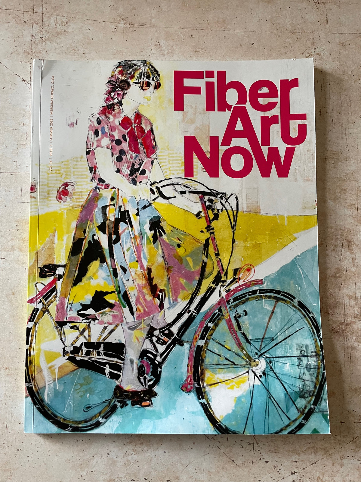 an art piece of a person on a bicycle