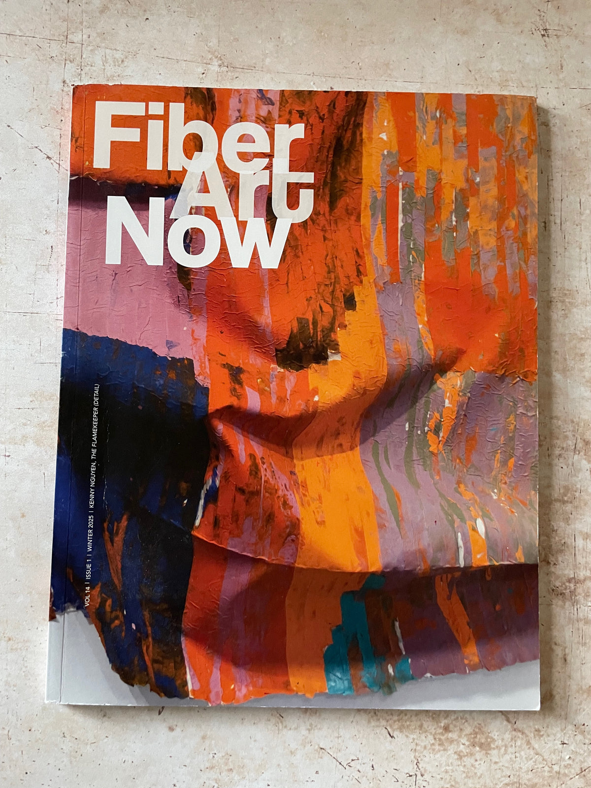 a bright modern painting on a magazine cover