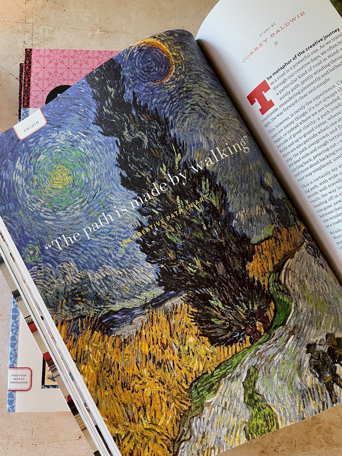 a painting of a tree in a field under a night sky