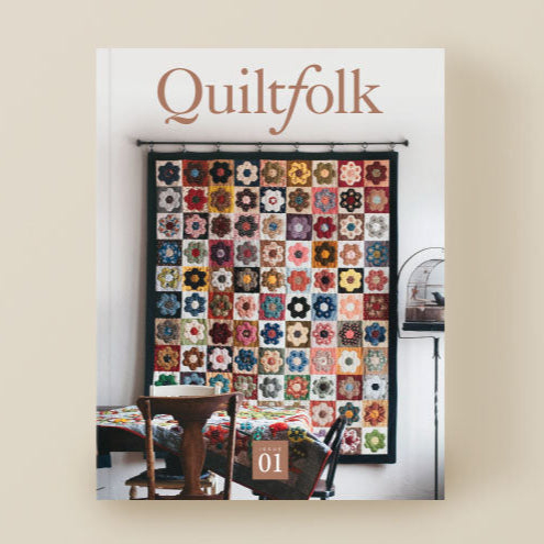 a flower quilt on a magazine cover