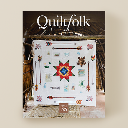 Quiltfolk magazine cover with a quilt featuring a star design on a beige background