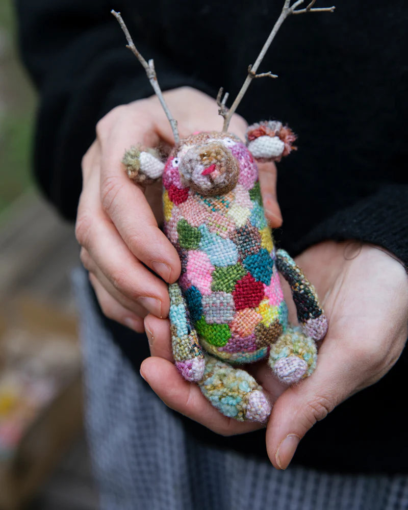 a colorful embroidered animal