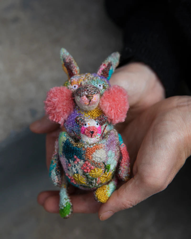 a colorful embroidered squirrel