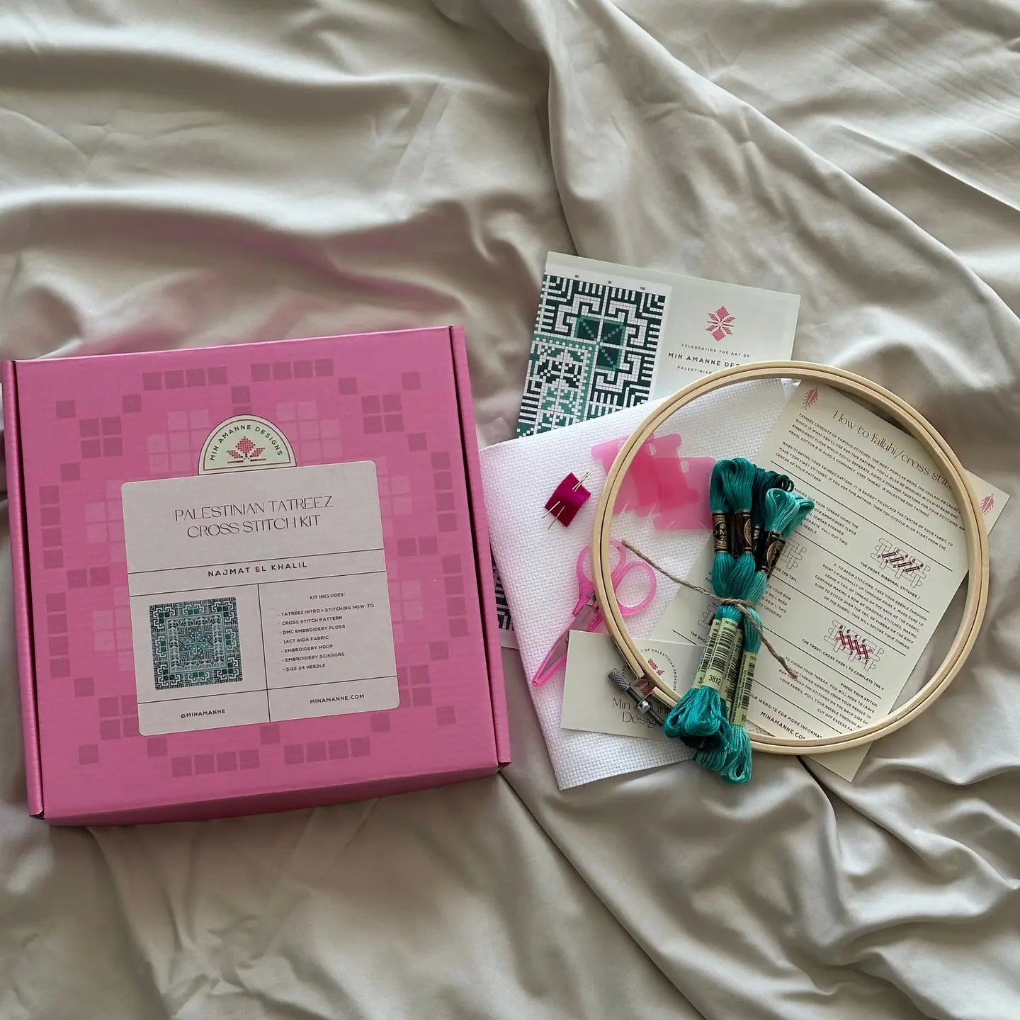 contents of a cross stitch embroidery kit