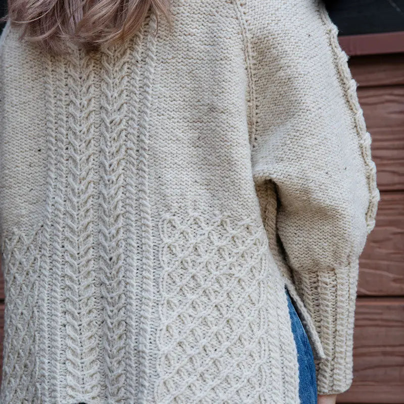 a cream cabled sweater