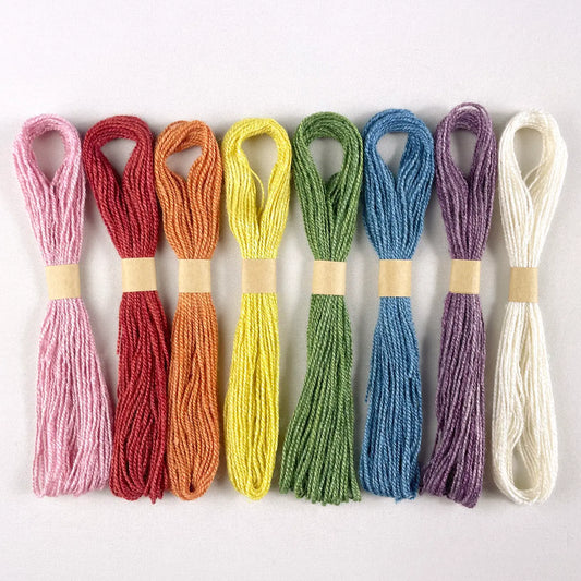 a set of rainbow silk floss
