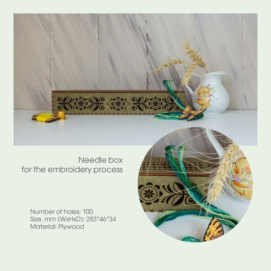 Needle box for embroidery with decorative elements on a light background